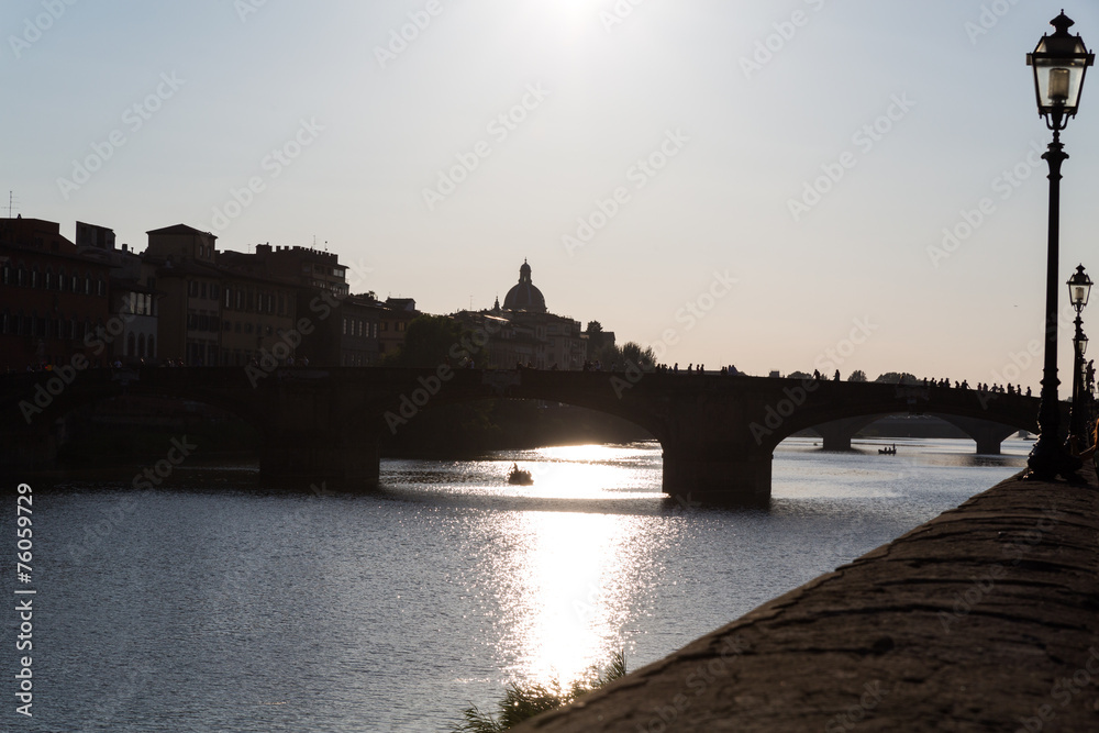 Silhouette of a bridge, Arno river in Florence, Italy