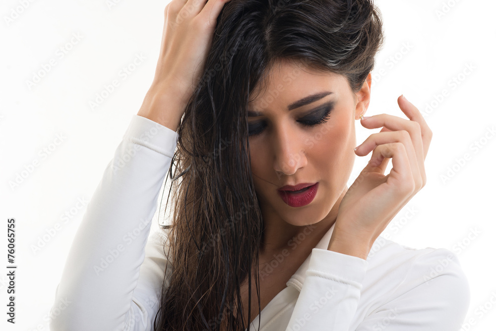 Intense woman portrait with wet hair isolated on white backgroun Intense woman portrait with wet hair isolated on white backgroun