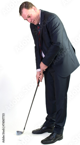Bussinesmann beim Golfspielen © vschlichting