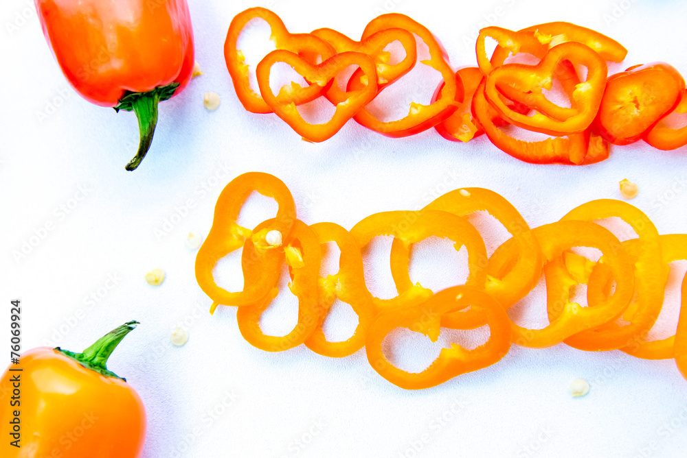 red, yellow, orange hot peppers sliced red, yellow, orange hot peppers sliced