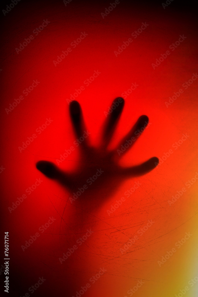 hands behind the frosted glass. fear, panic, scream concept. hands behind the frosted glass. fear, panic, scream concept.