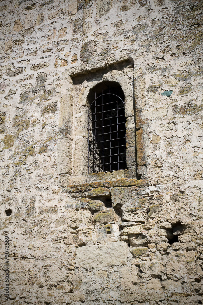 window in the wall of an ancient fortress