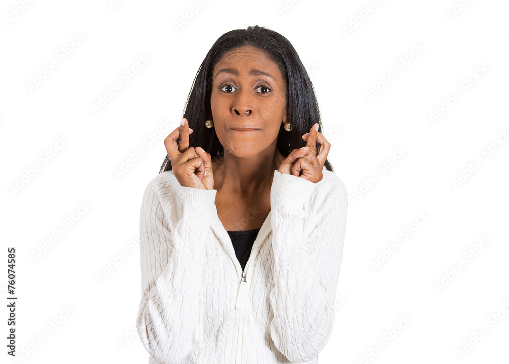 woman crossing her fingers hoping, waiting, asking for best woman crossing her fingers hoping, waiting, asking for best