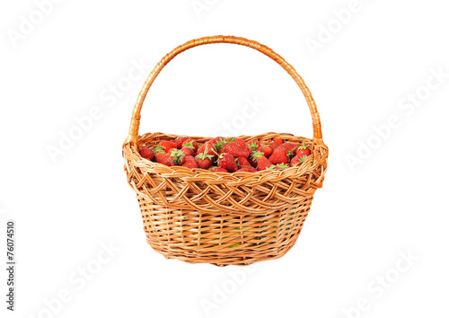 Strawberry in a wattled basket, isolated on a white background