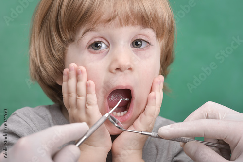 Small child and dental instrument