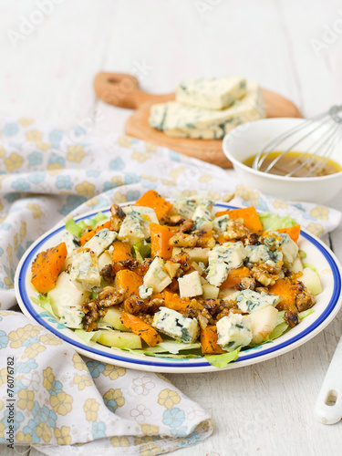 salad with pear, pumpkin, nuts and blue cheese