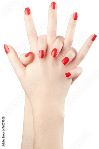 Female hands with red nail polish on white, clipping path