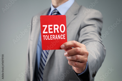 Valokuva Businessman showing the zero tolerance red card
