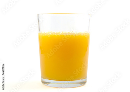 Glass of orange juice on white background.