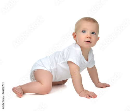 Infant child baby toddler sitting or crawling happy smiling look © Dmitry Lobanov