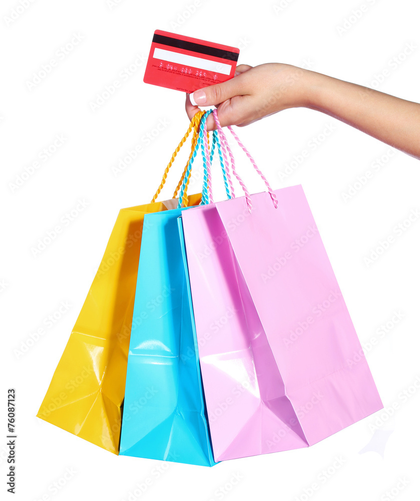 Colorful Shopping Bags and Credit Card in Female Hand isolated
