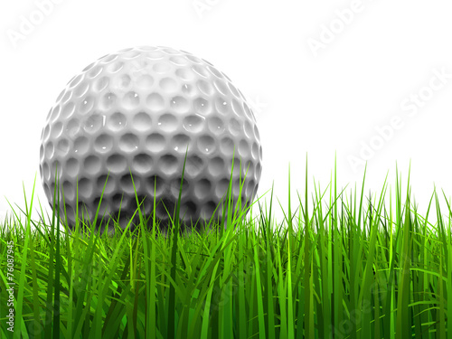 White golf ball in grass isolated