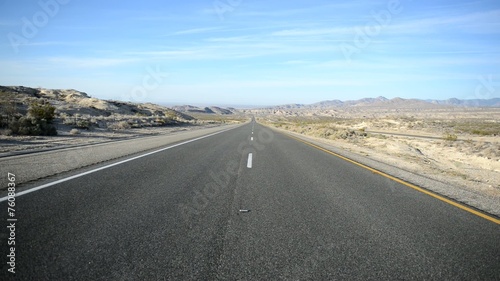 Remote stretch of road on Interstate in Desert and Mountains