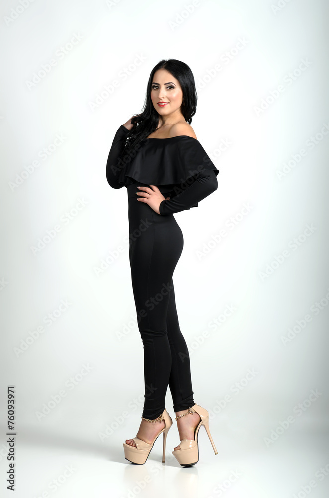 Sexy brunette woman posing isolated on white background Sexy brunette woman posing isolated on white background