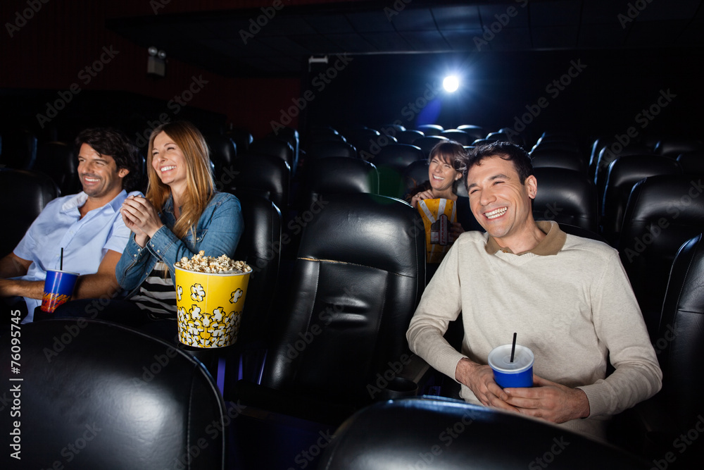 Obraz premium Happy People Watching Film