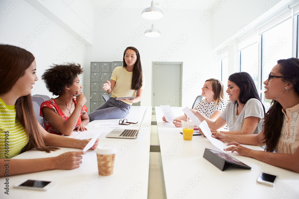 Group Of Women Working Together In Design Studio - obrazy, fototapety, plakaty 