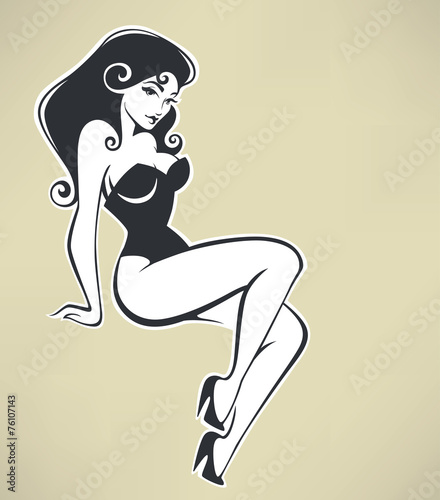 sitting pinup girl on beige background photo
