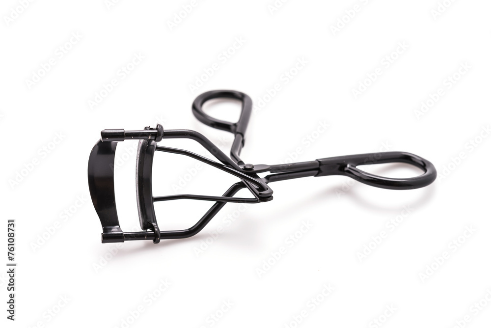 Black eyelash curler isolated on white