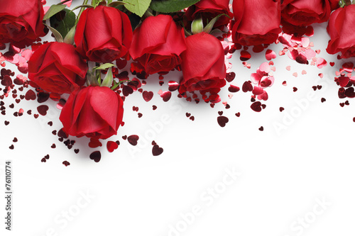 Red roses and heart shape ornaments photo