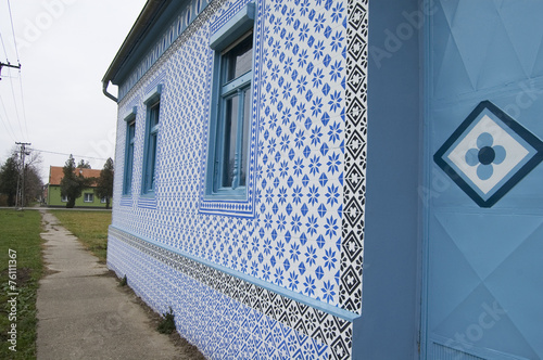 Old village house plastered tiles photo