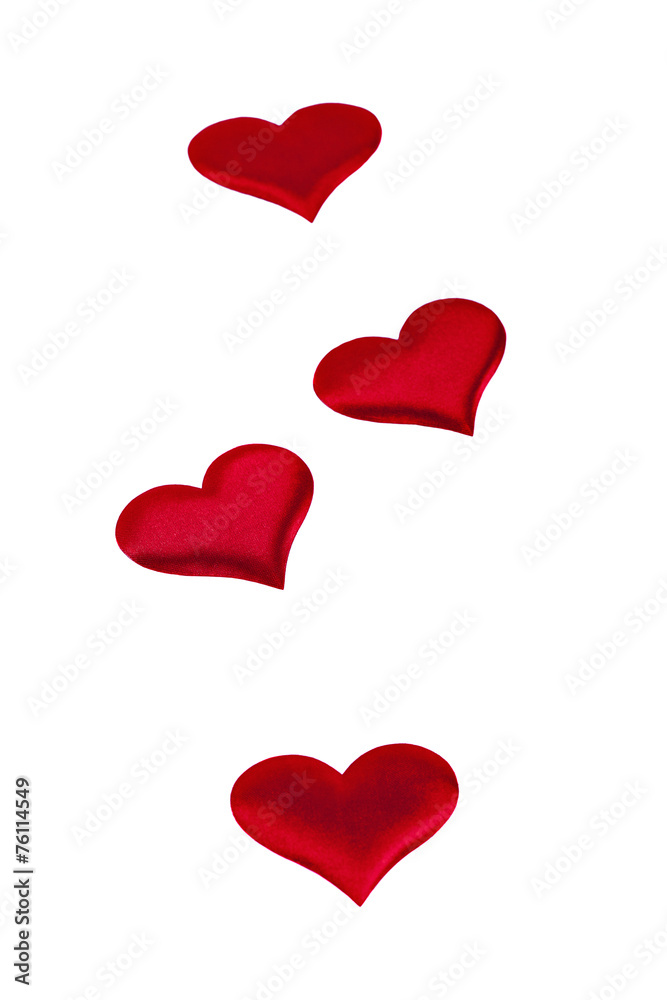 red hearts Valentine's Day symbols on a white background closeup