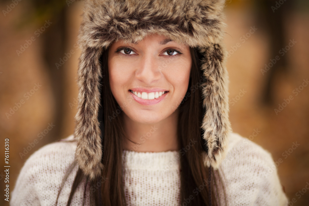 Beautiful young woman with brown fur hat Beautiful young woman with brown fur hat