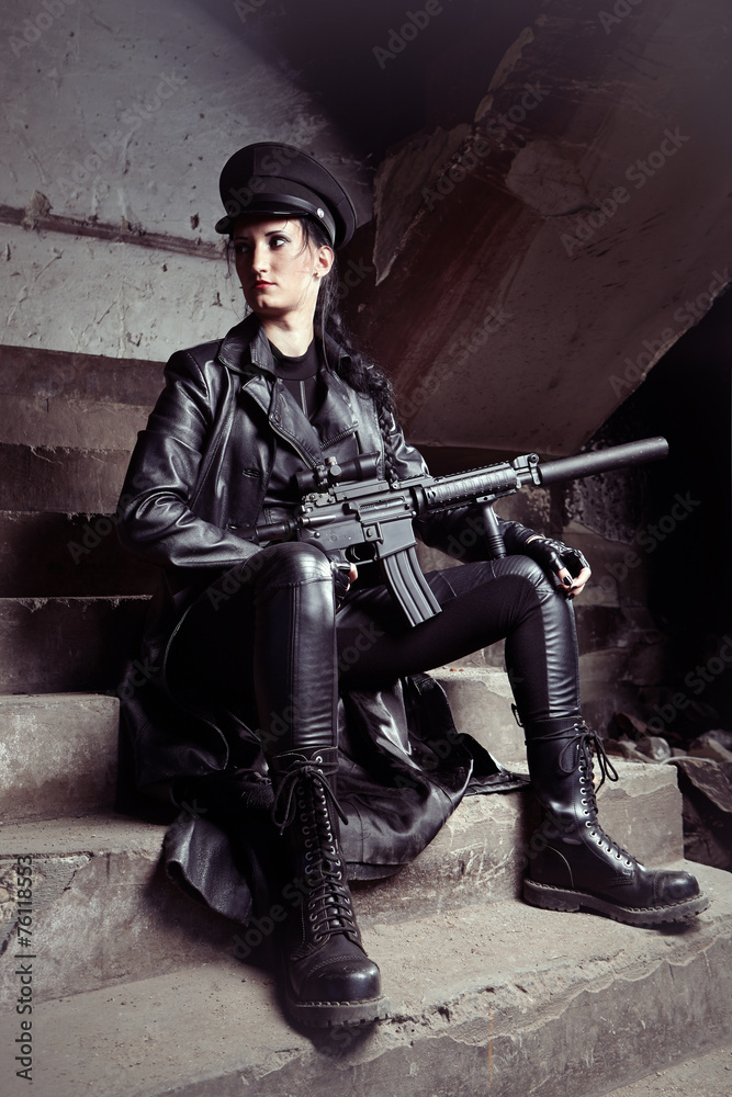 Naklejka premium Lady and automatic rifle