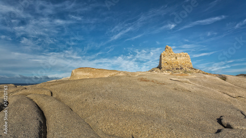 Genoese tower at Punta Caldanu near Lumio in Corsica photo