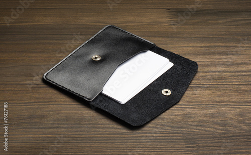Leather visiting card holder stationary briefcase on wood