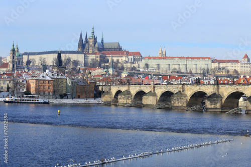 Snowy Prague gothic Castle with Charles Bridge, Czech Republic