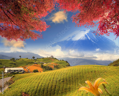 Image of the sacred mountain of Fuji in the background of blue s photo