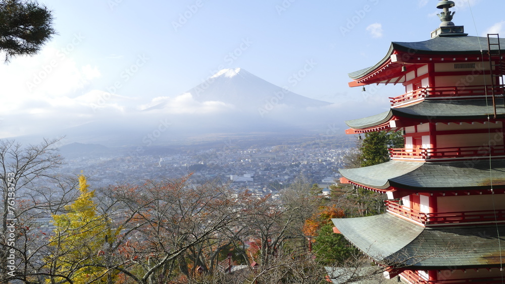 Image of the sacred mountain of Fuji in the background of blue s