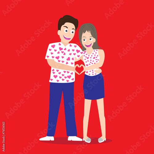 Happy couple showing making heart shape sign with hands