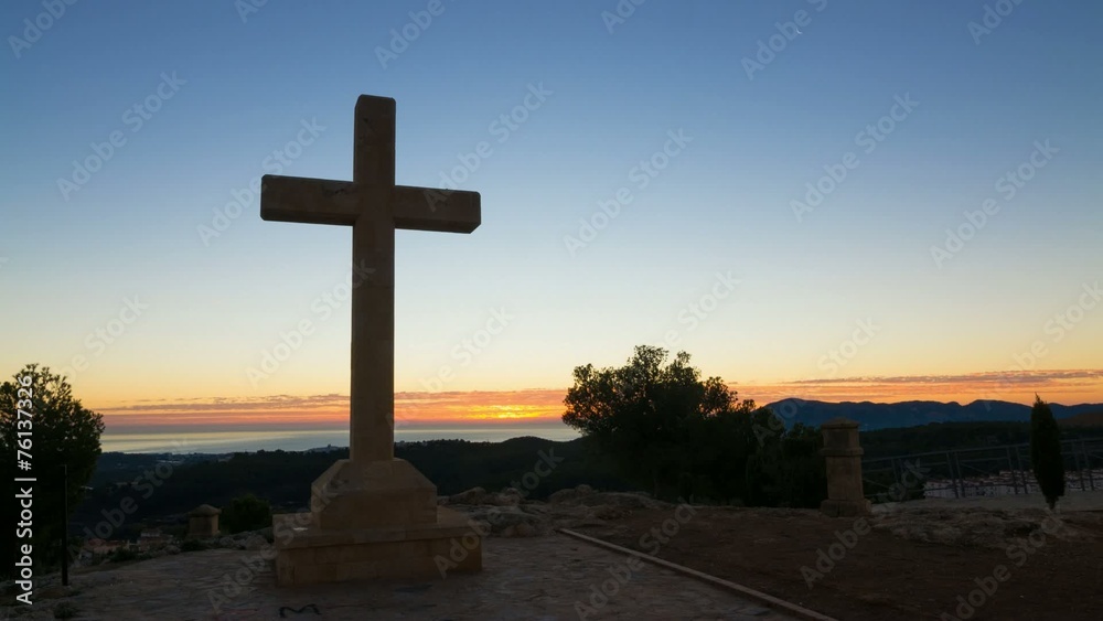 Huge cross against the background of a sunrise Huge cross against the background of a sunrise