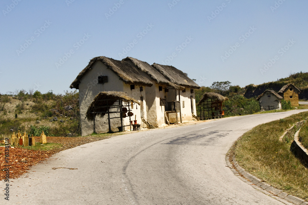 Typical malgasy village - african hut, poverty in madagascar