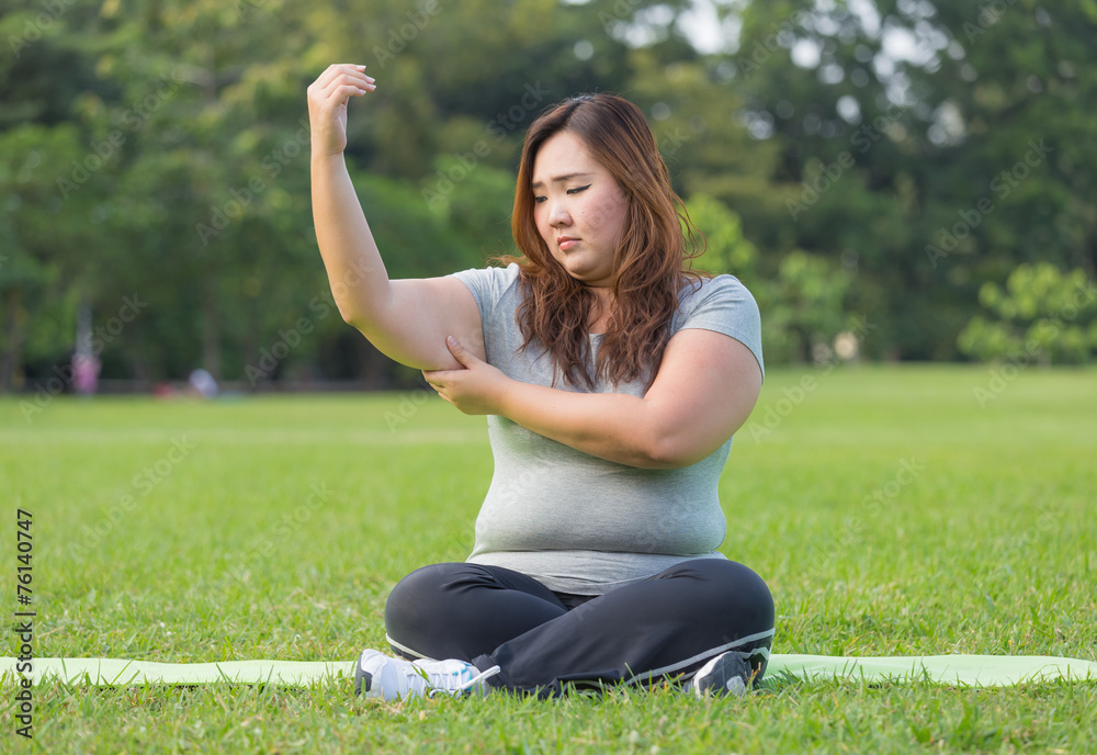 Obese woman is worrying about her overweight Obese woman is worrying about her overweight