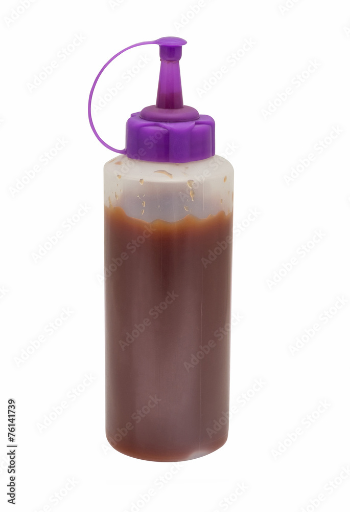 The sauce is ketchup squeeze bottle inside. isolate with selecti The sauce is ketchup squeeze bottle inside. isolate with selecti
