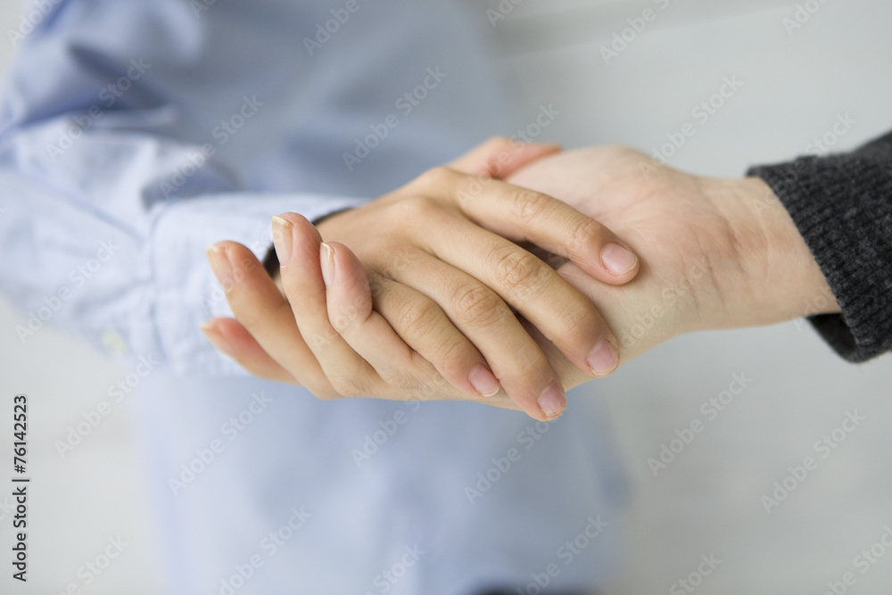 The hands of the son and mother The hands of the son and mother