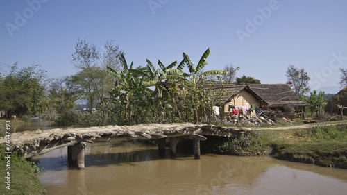 Wooden bridge in traditional village in Nepal