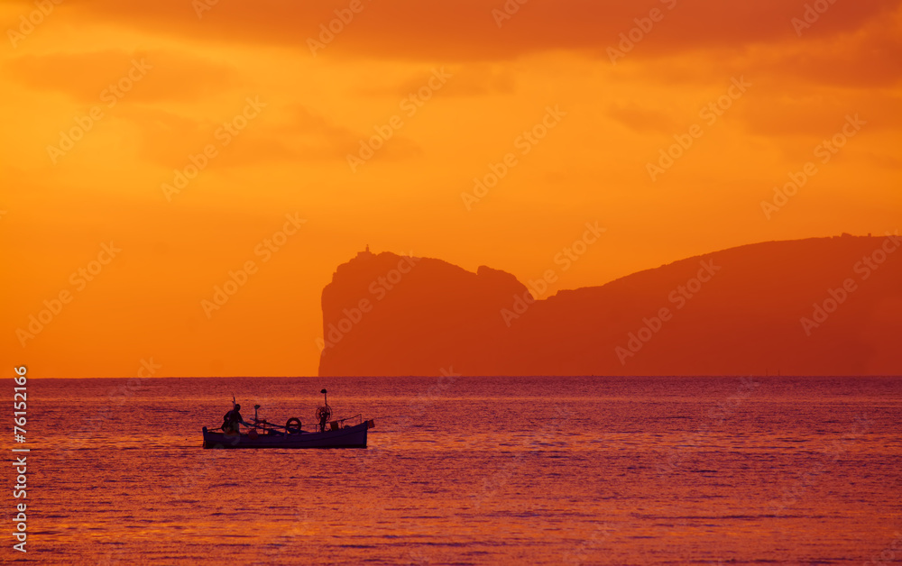 fishing boat at sunset