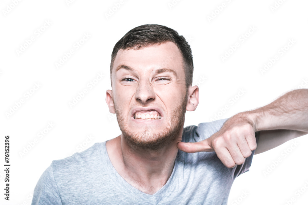 Fototapeta premium Very angry young man on whited