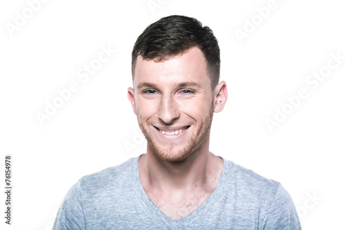 Happy young man on white