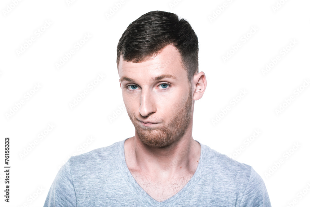 Sad and unhappy young man
