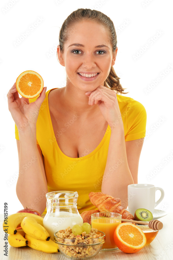 Young woman having breakfast. Balanced diet Young woman having breakfast. Balanced diet