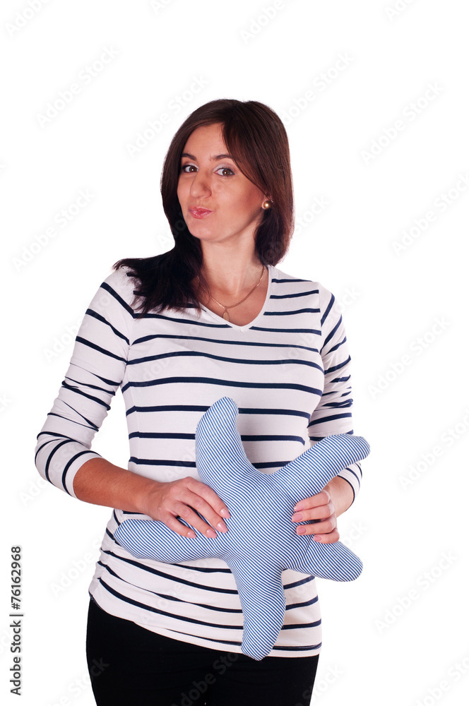 Pretty pregnant woman portrait with toy star Pretty pregnant woman portrait with toy star