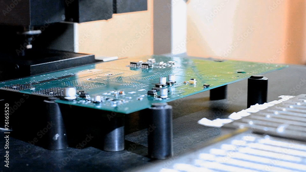 Install components on PCB robotic arm