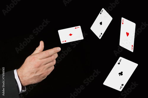 Cuadro en lienzo Flying cards is in the hand of lucky gambler
