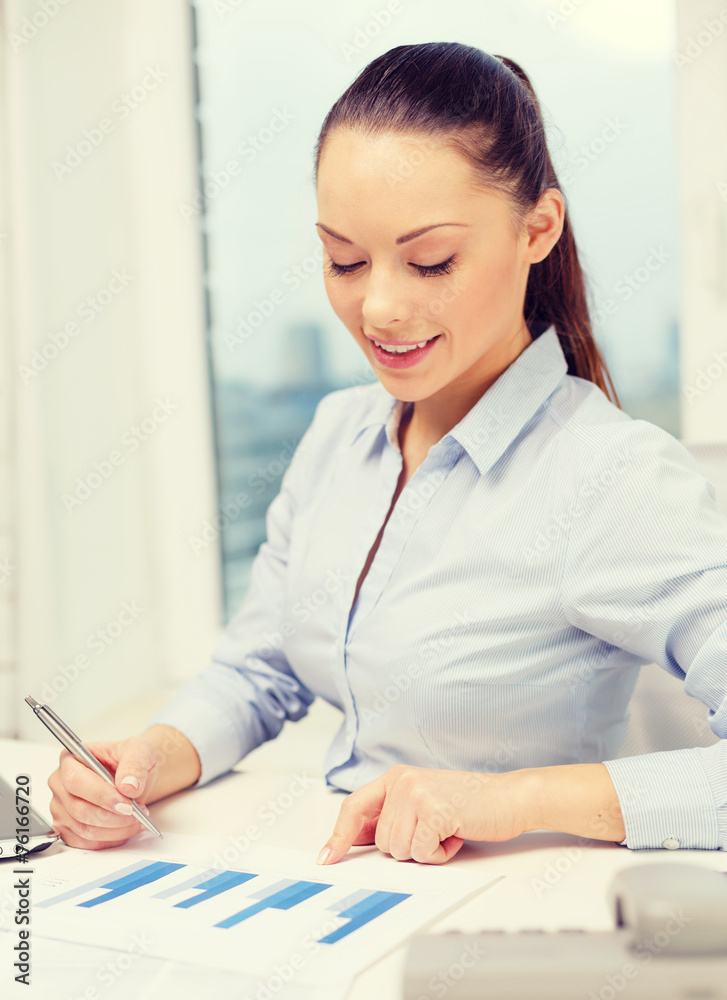 businesswoman with phone, laptop and files businesswoman with phone, laptop and files