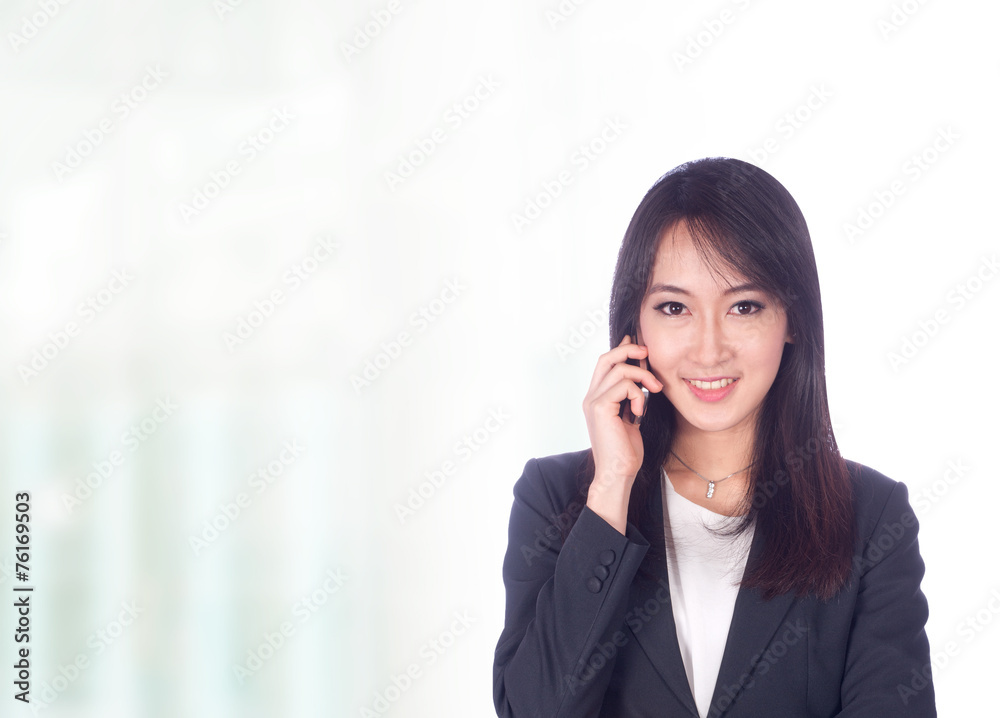 Portrait of young asia business woman in her office.Mixed Asian / Caucasian businesswoman. Portrait of young asia business woman in her office.Mixed Asian / Caucasian businesswoman.