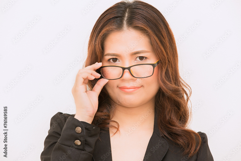 Young business woman in glasses.